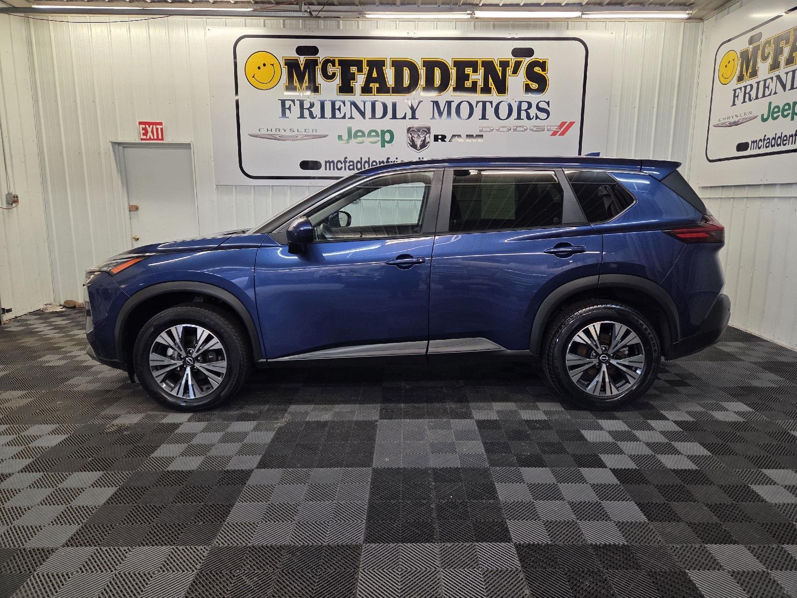 Used 2023 Caspian Blue Metallic Nissan SV image 4