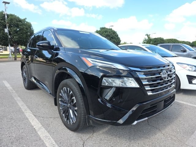 Used 2024 Black Nissan Platinum image 1