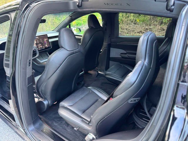 Used 2022 Solid Black Tesla Base image 12