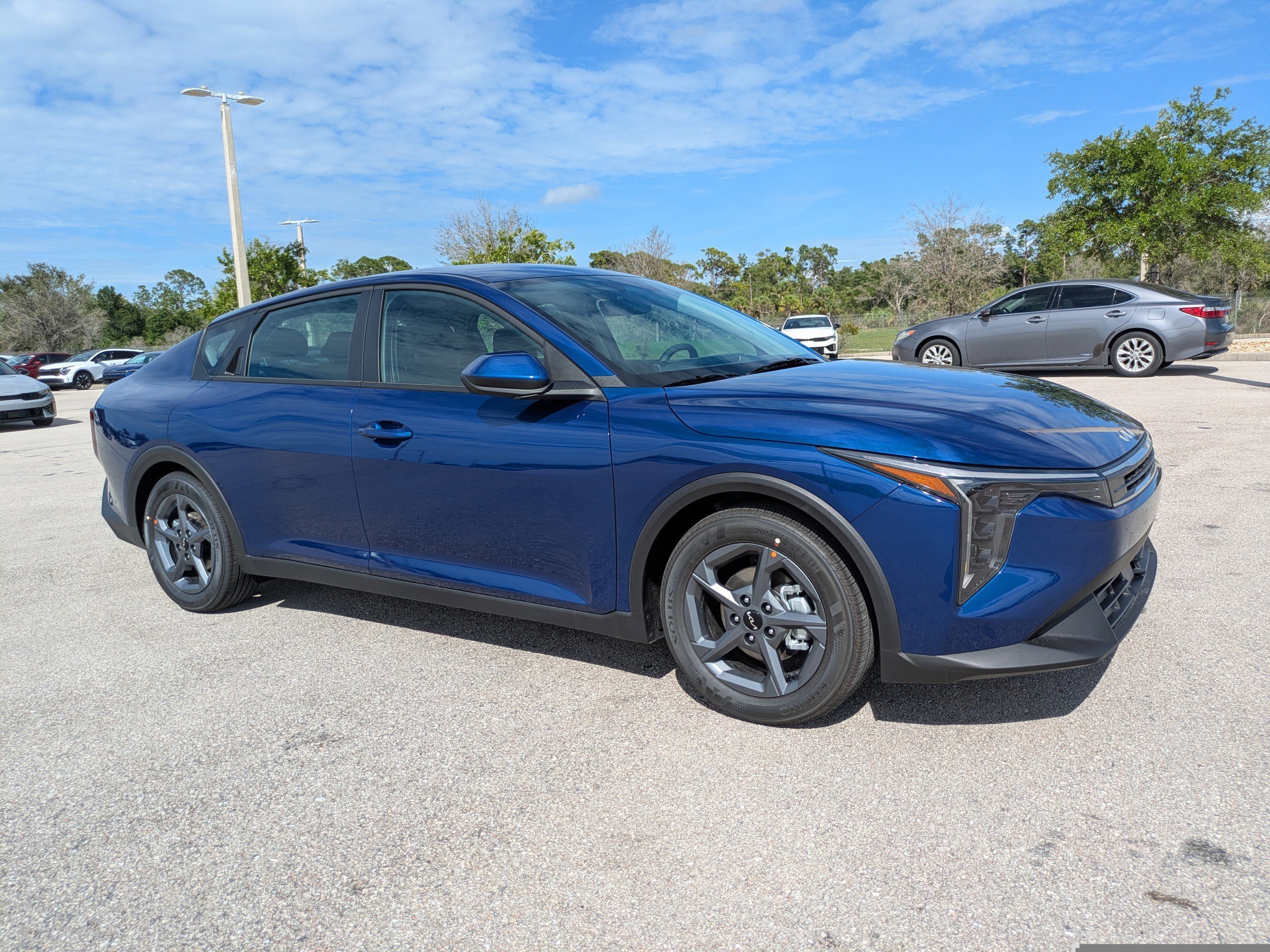 New 2026 Deep Sea Blue Kia LXS image 2