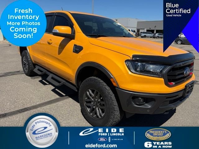 Used 2022 Orange Ford Lariat Tremor image 1
