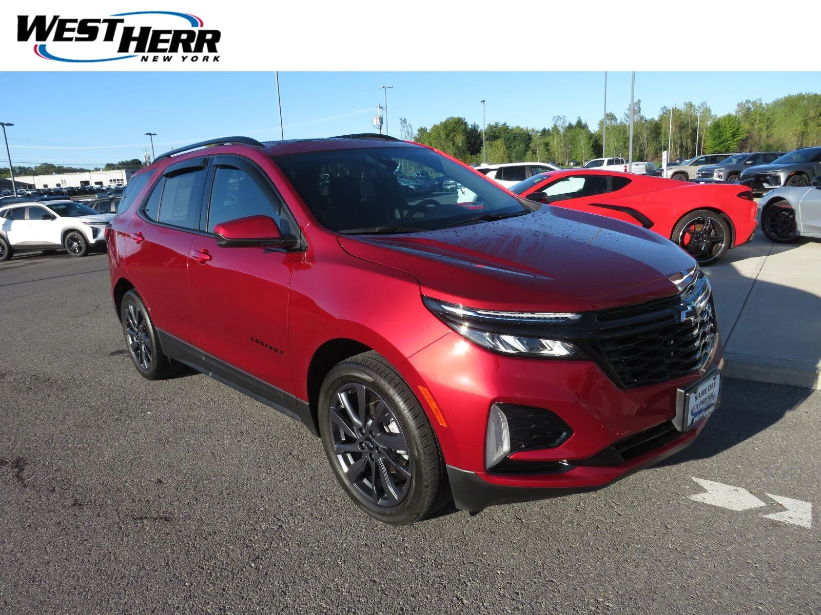 Used 2024 Radiant Red Tintcoat Chevrolet RS image 1