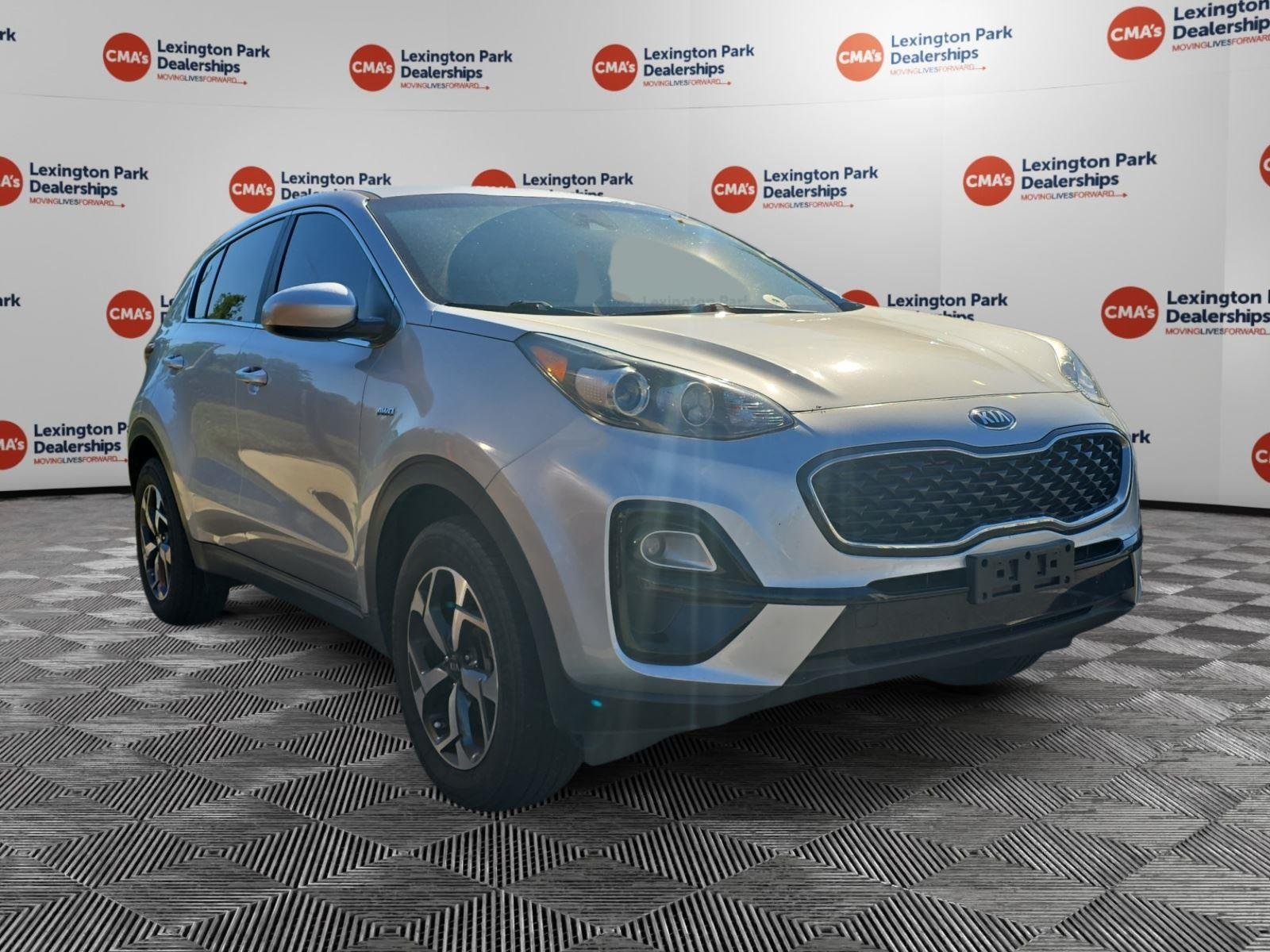 Used 2020 Sparkling Silver Kia LX image 1
