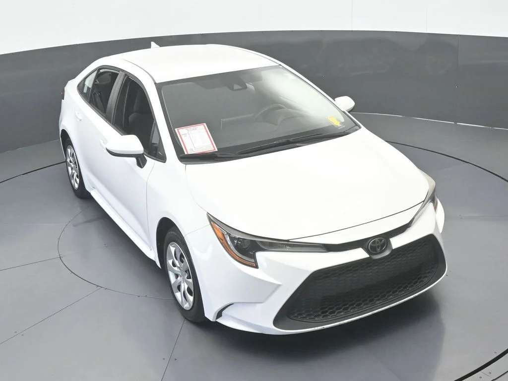 Used 2021 Super White Toyota LE image 43