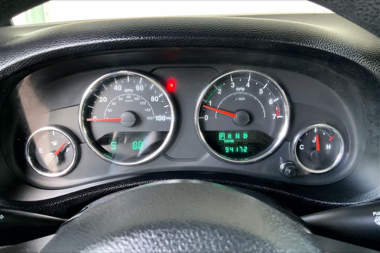 Used 2012 Black Forest Green Pearl Jeep Sport image 25