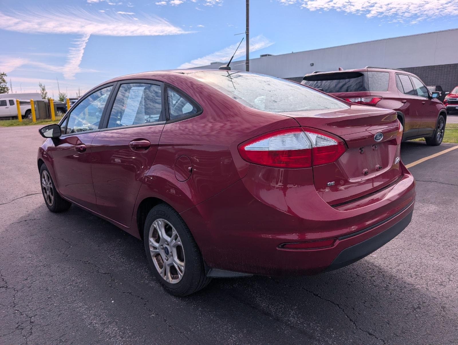 Used 2016 Ruby Red Metallic Tinted Clearcoat Ford SE image 5