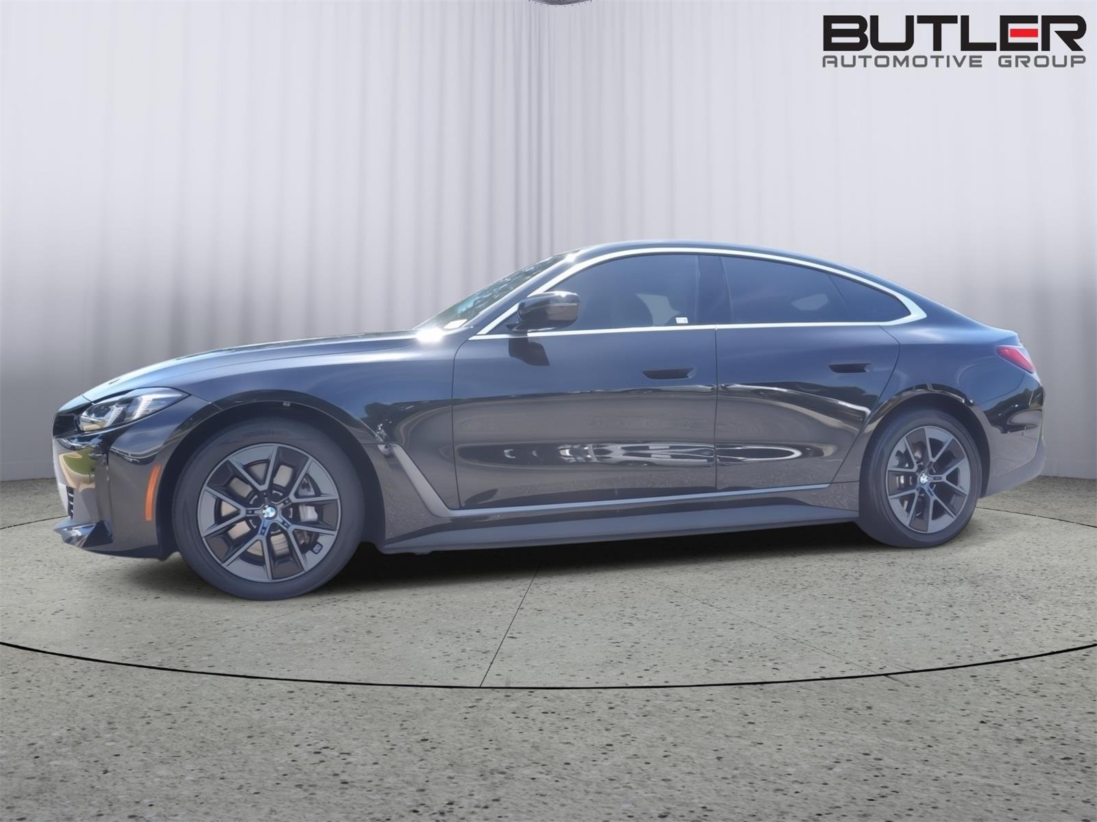 Used 2025 Black Sapphire Metallic BMW eDrive40 image 1