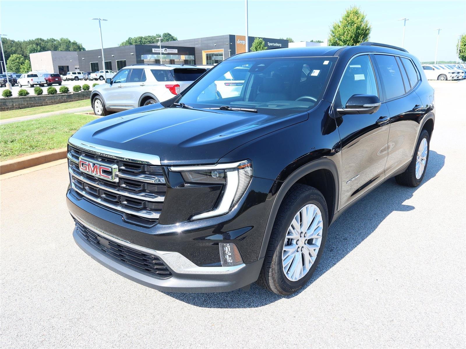 Used 2026 Ebony Twilight Metallic GMC FWD Elevation image 3