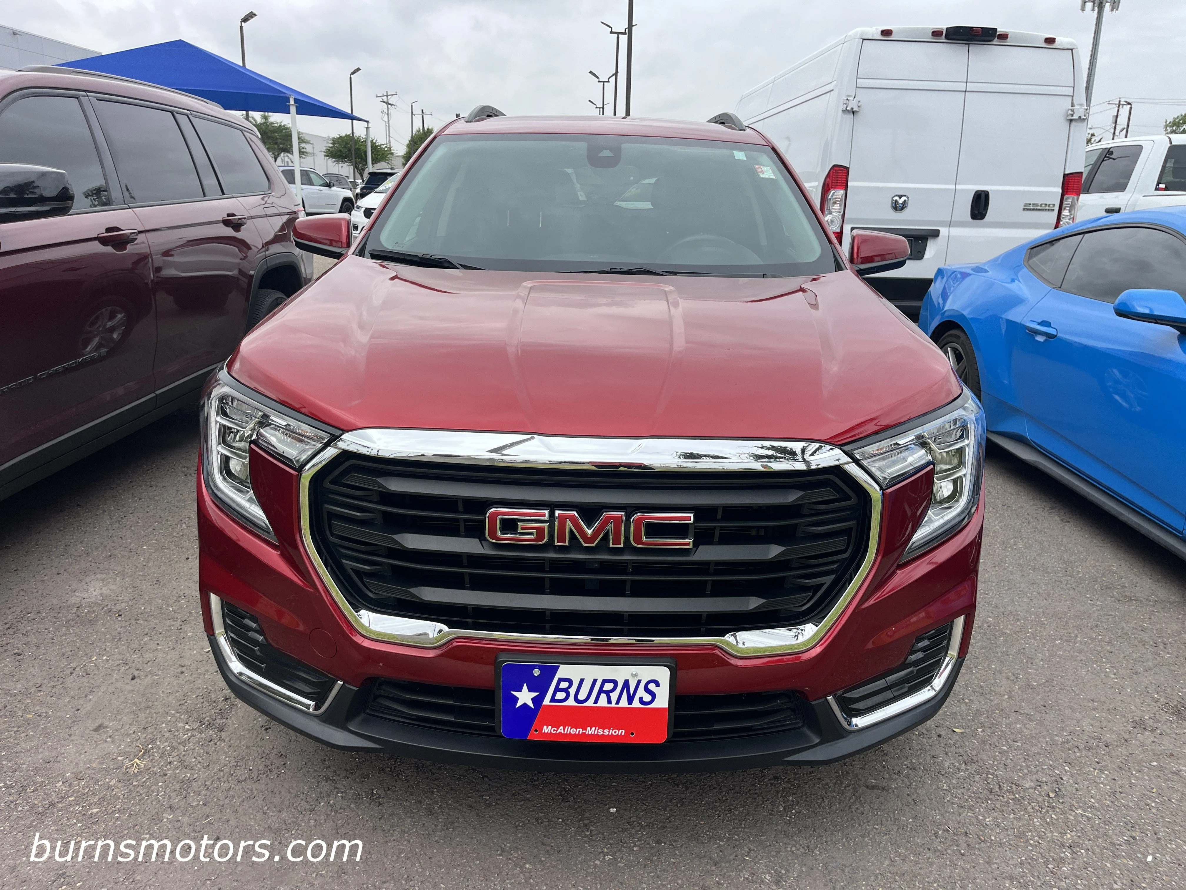 Used 2024 Volcanic Red Tint GMC SLE image 3