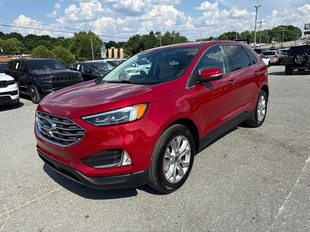 Used 2023 Red Ford Titanium image 1