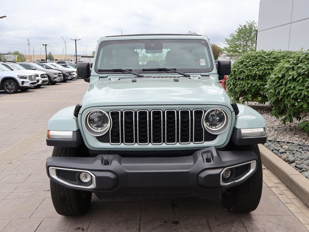 Used 2024 Jeep Wrangler 4-Door Sahara with VIN 1C4PJXEG6RW324770 for sale in Kansas City
