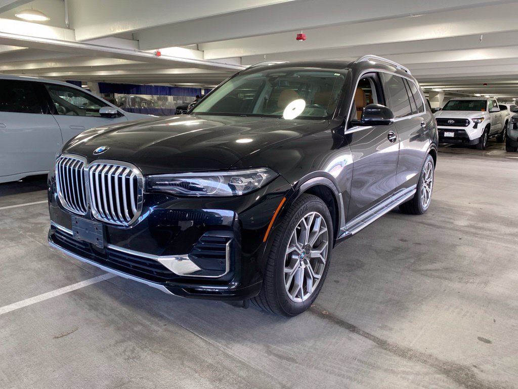 Used 2019 Black Sapphire Metallic BMW xDrive40i image 1