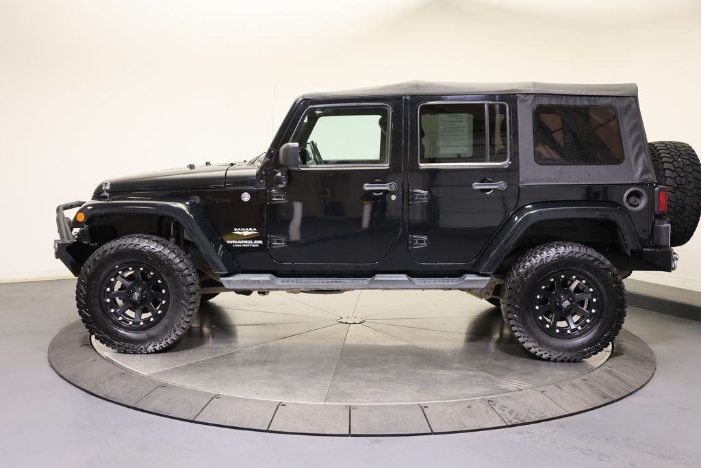 Used 2013 Jeep Wrangler Unlimited Sahara with VIN 1C4BJWEG2DL677778 for sale in Darien, CT