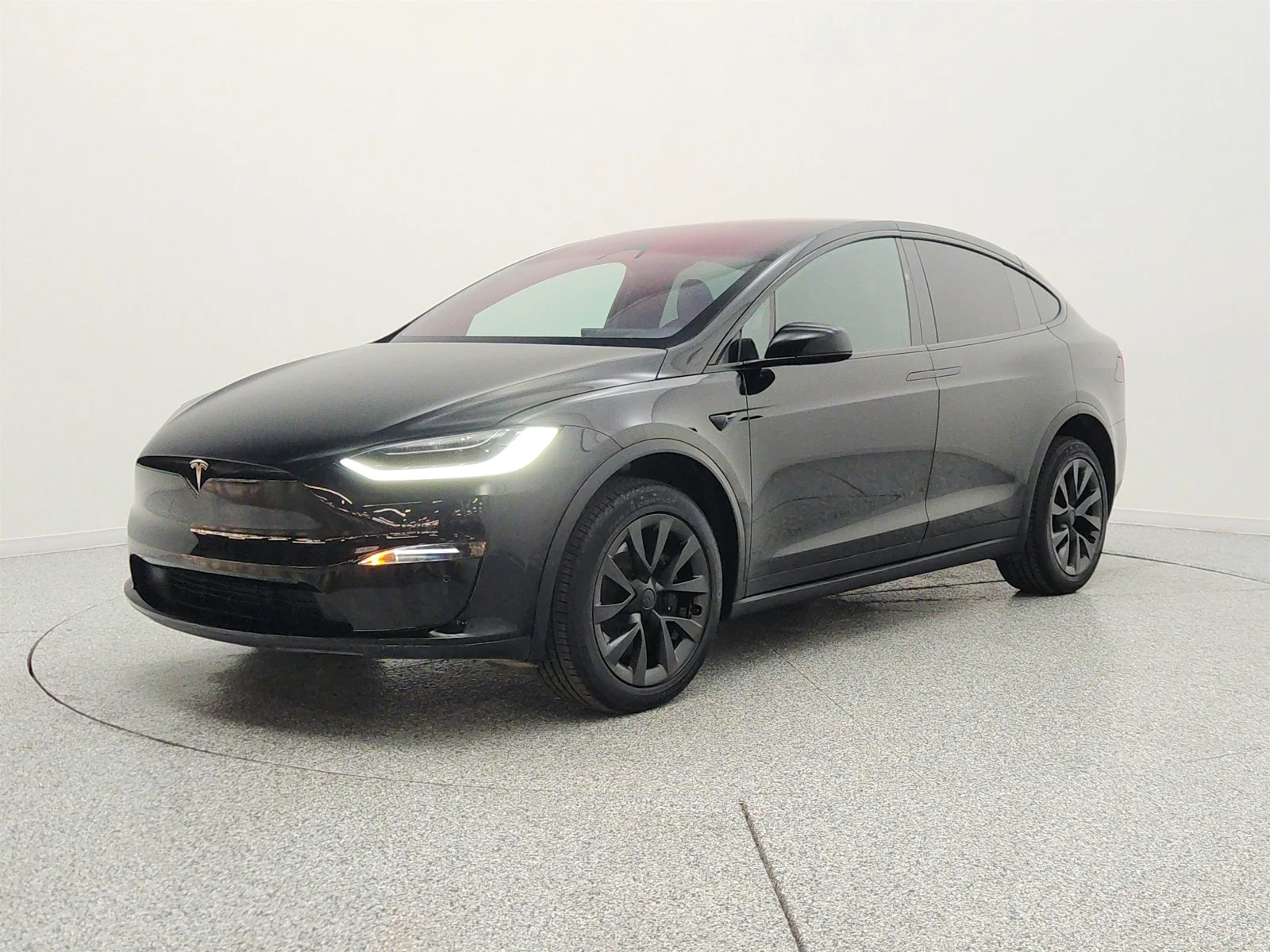 Used 2023 Solid Black Tesla AWD image 1