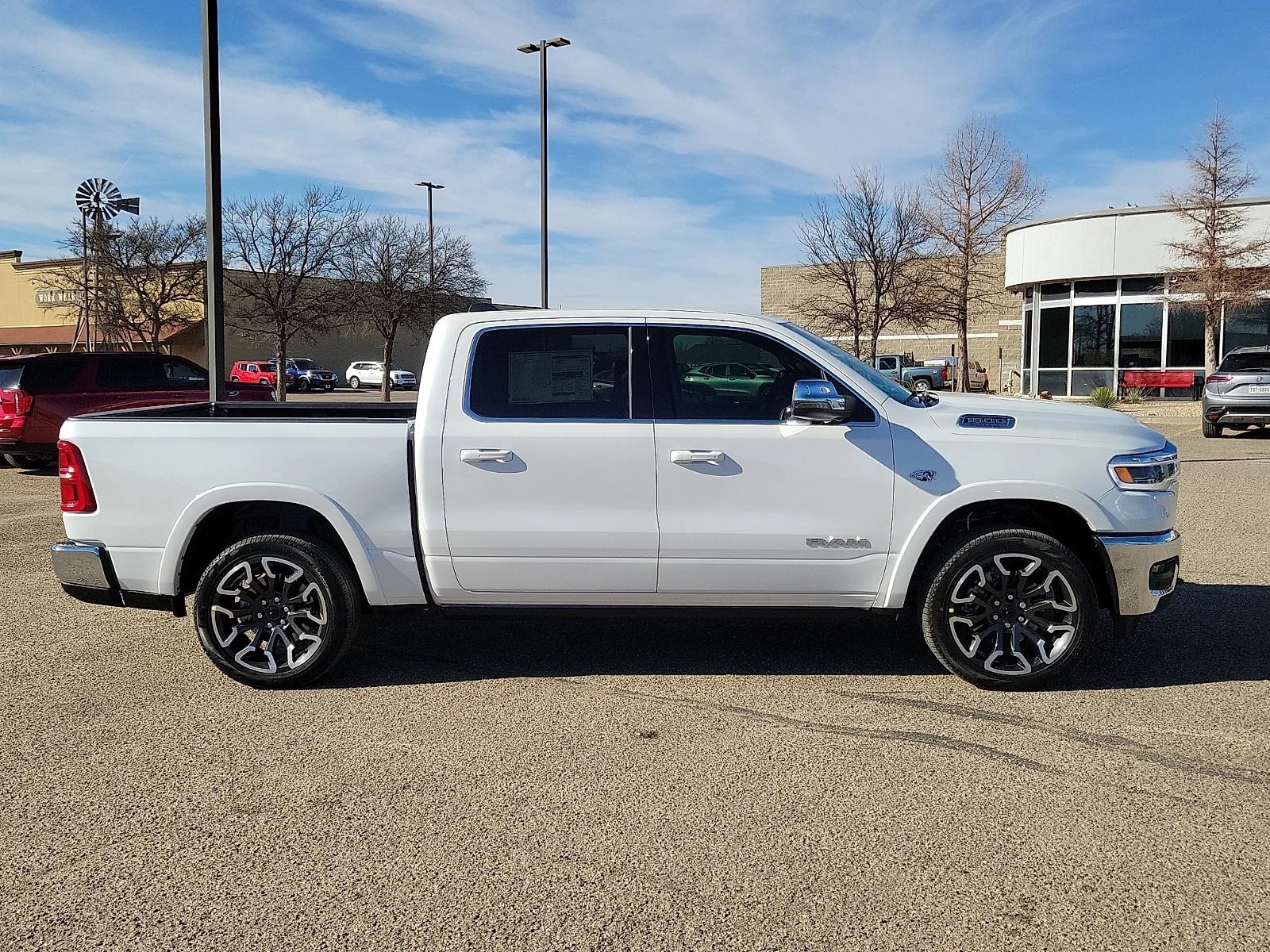 New 2026 Bright White Ram LIMITED LONGHORN CREW CAB 4X4 5