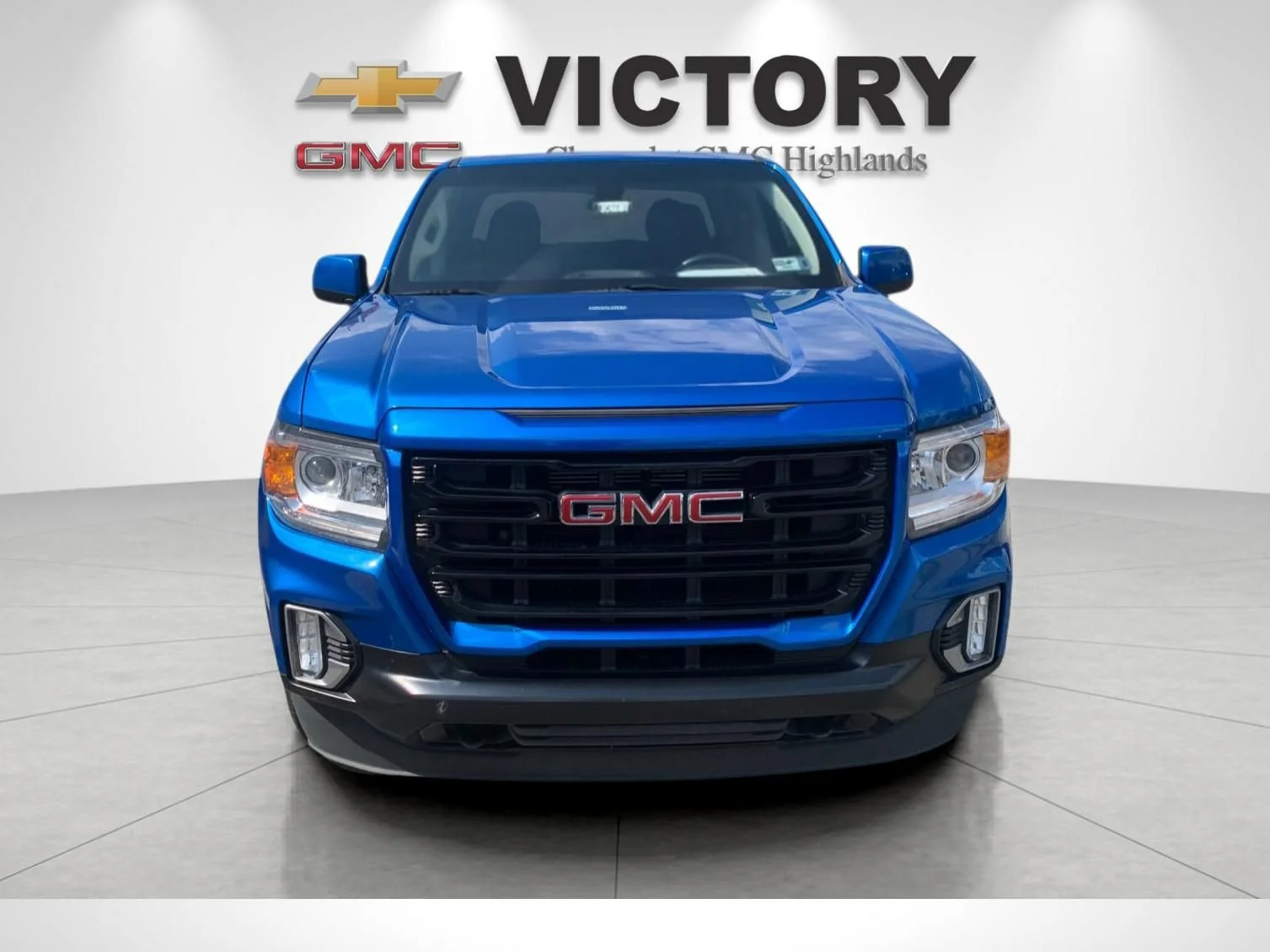 Used 2022 DYNAMIC BLUE METALLIC GMC 4WD Elevation image 8