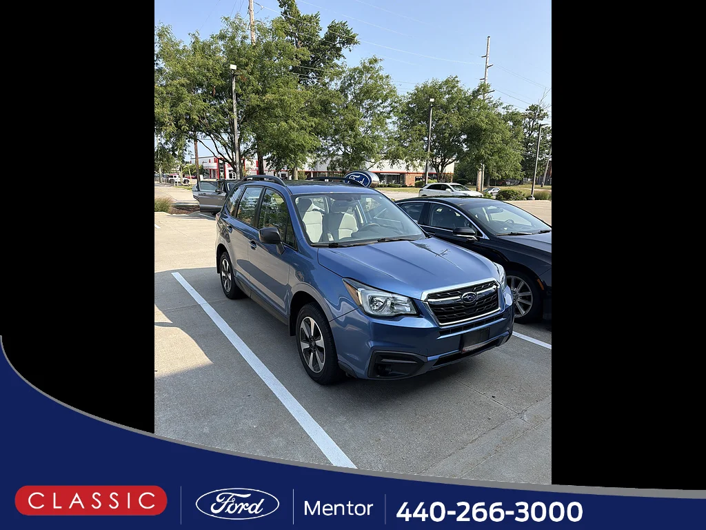 Used 2017 Quartz Blue Pearl Subaru 2.5i image 1