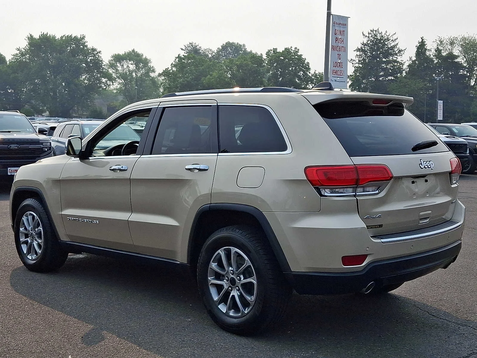 Used 2014 Cashmere Pearlcoat Jeep Limited image 4