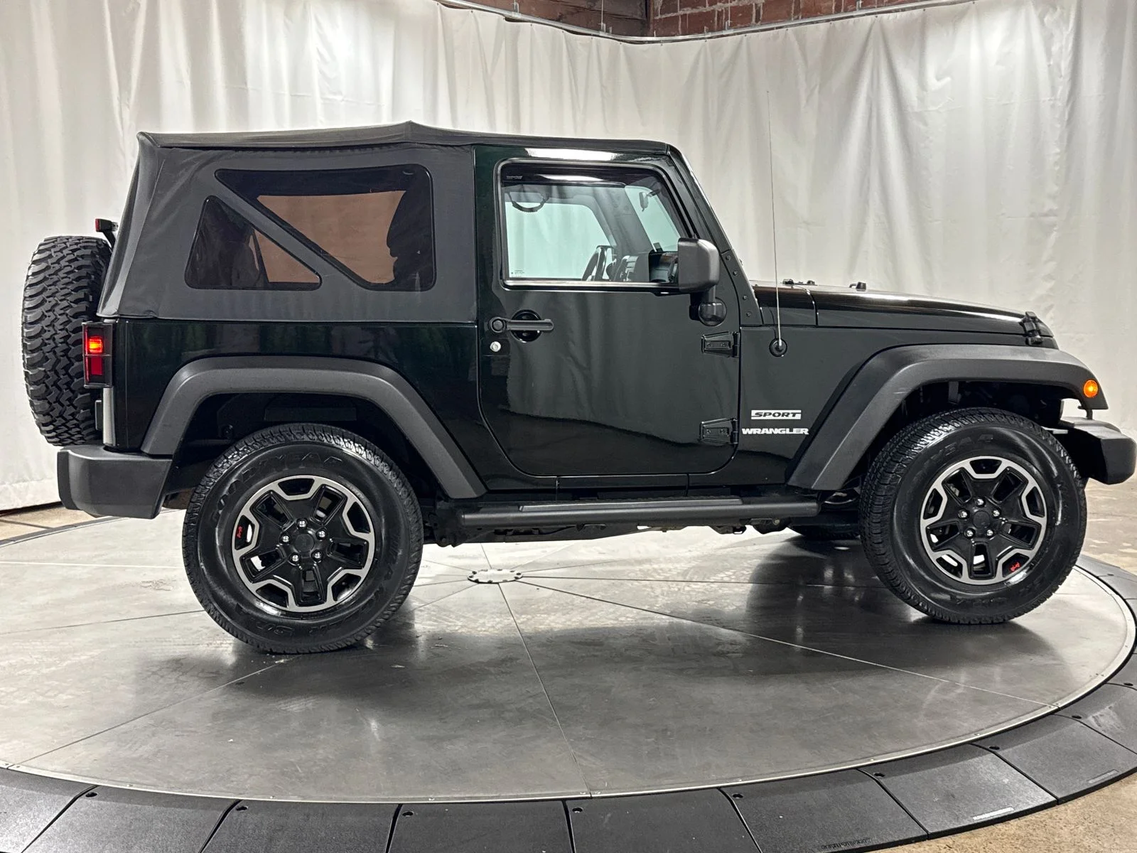 Used 2012 Black / Forest Green Jeep Sport image 6