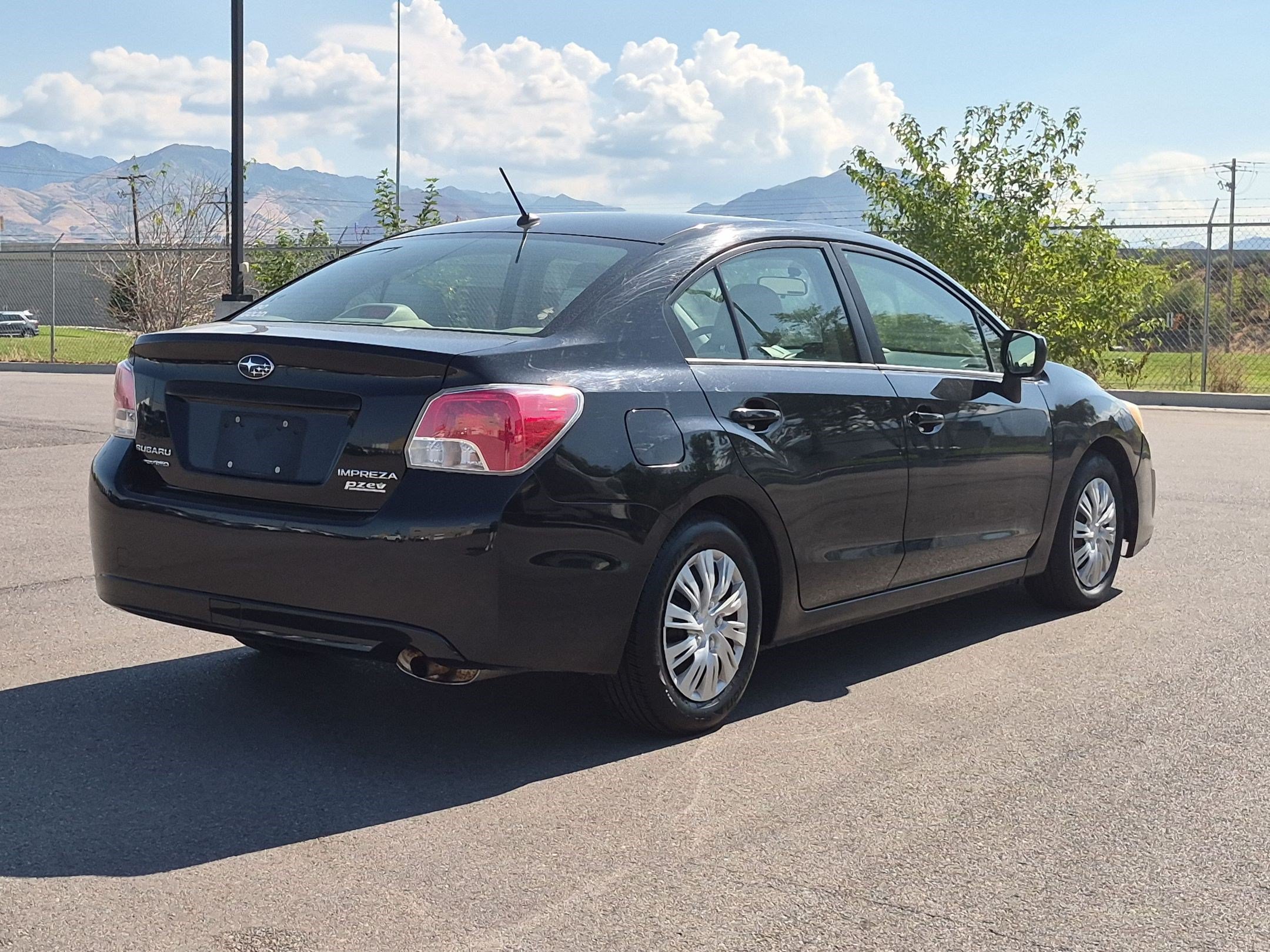 Used 2012 Obsidian Black Pearl Subaru 2.0i image 3