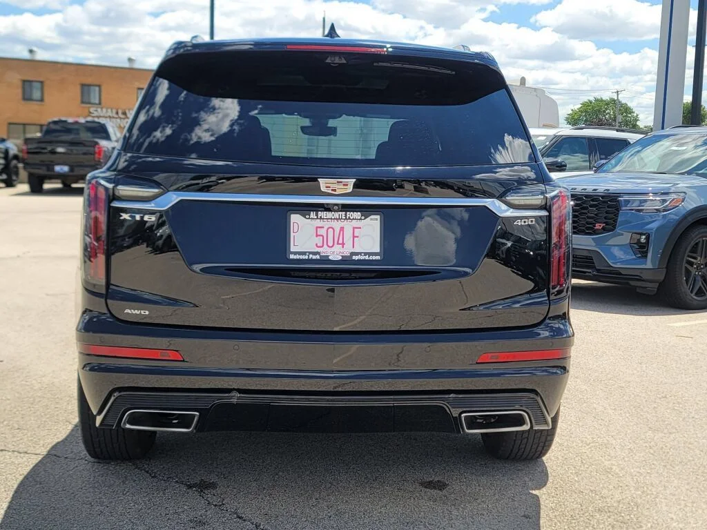 Used 2024 Black Metallic Cadillac Sport image 12