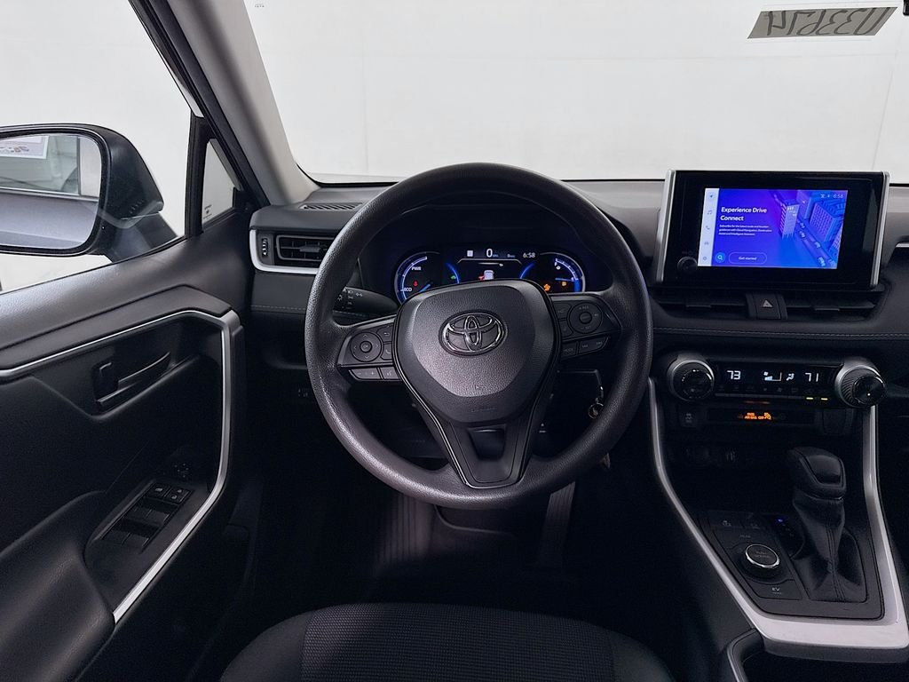 Used 2024 Magnetic Gray Metallic Toyota Hybrid LE image 22
