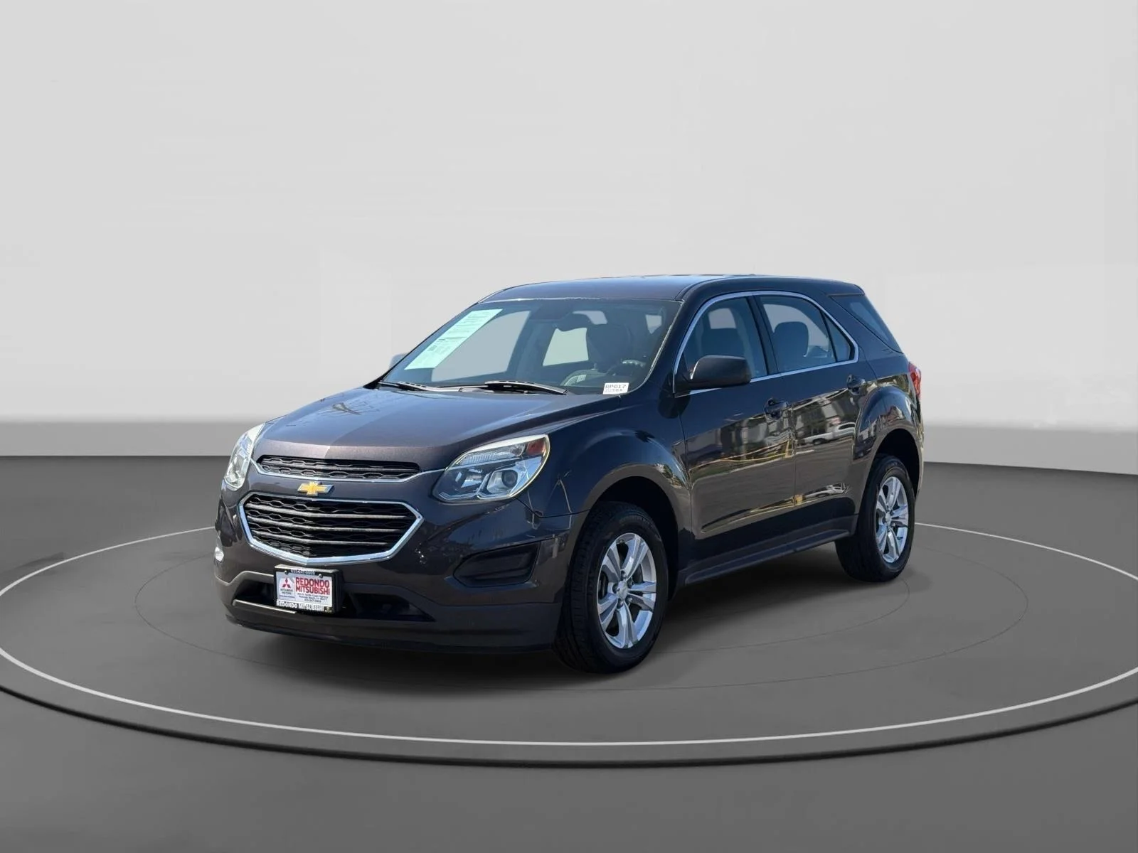 Used 2016 Tungsten Metallic Chevrolet LS image 1