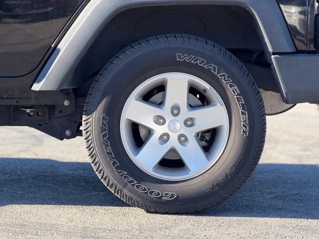 Used 2014 Black Jeep Unlimited Sport image 2