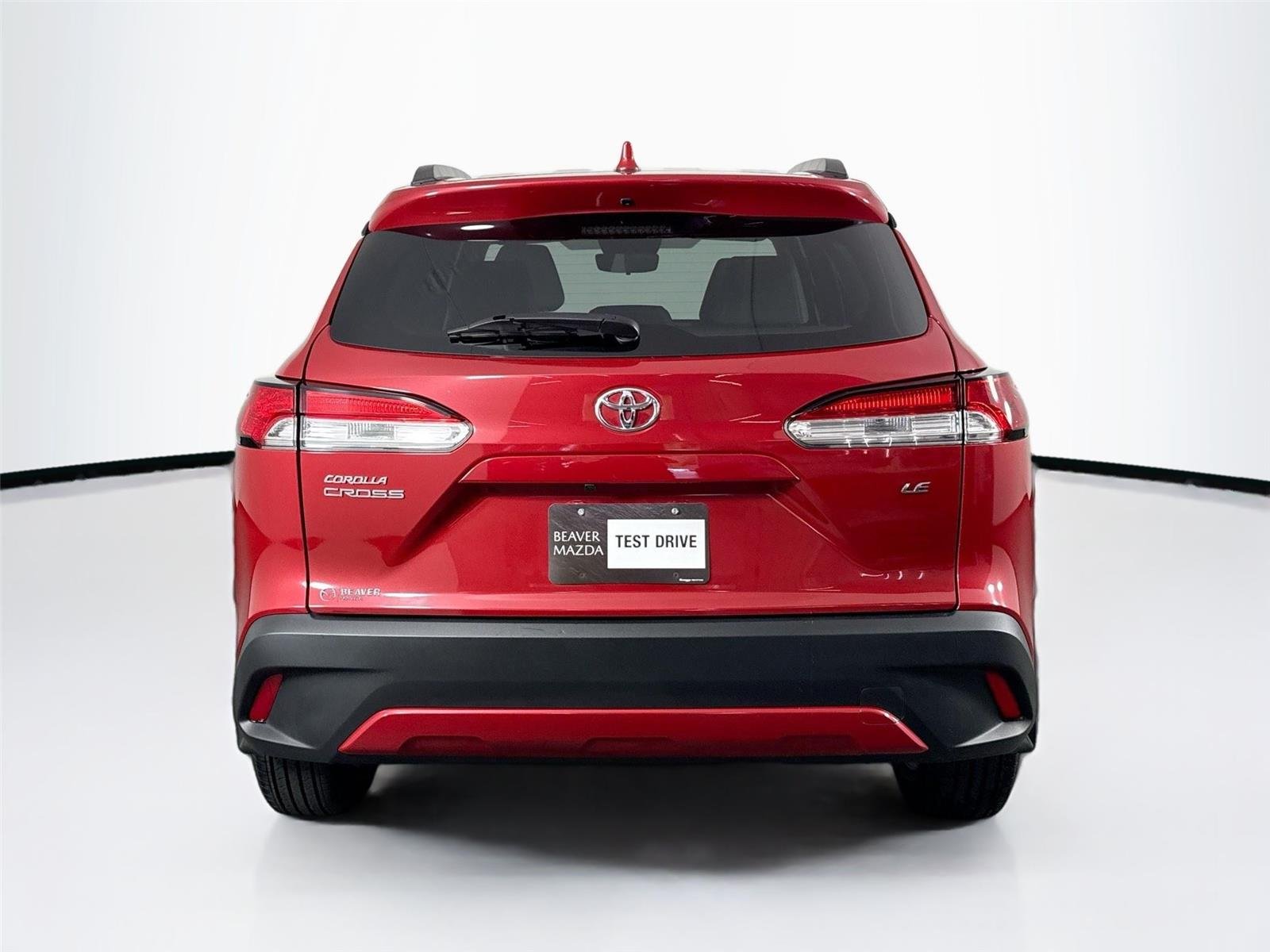 Used 2024 Barcelona Red Metallic Toyota LE image 11