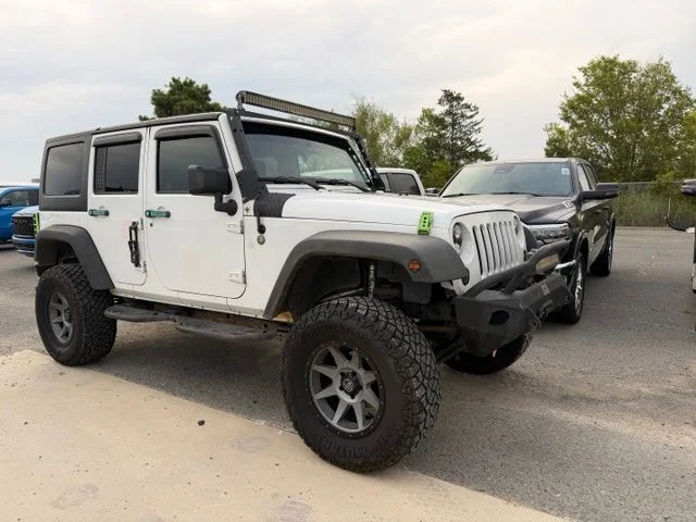Used 2015 White Jeep Unlimited Sport image 10