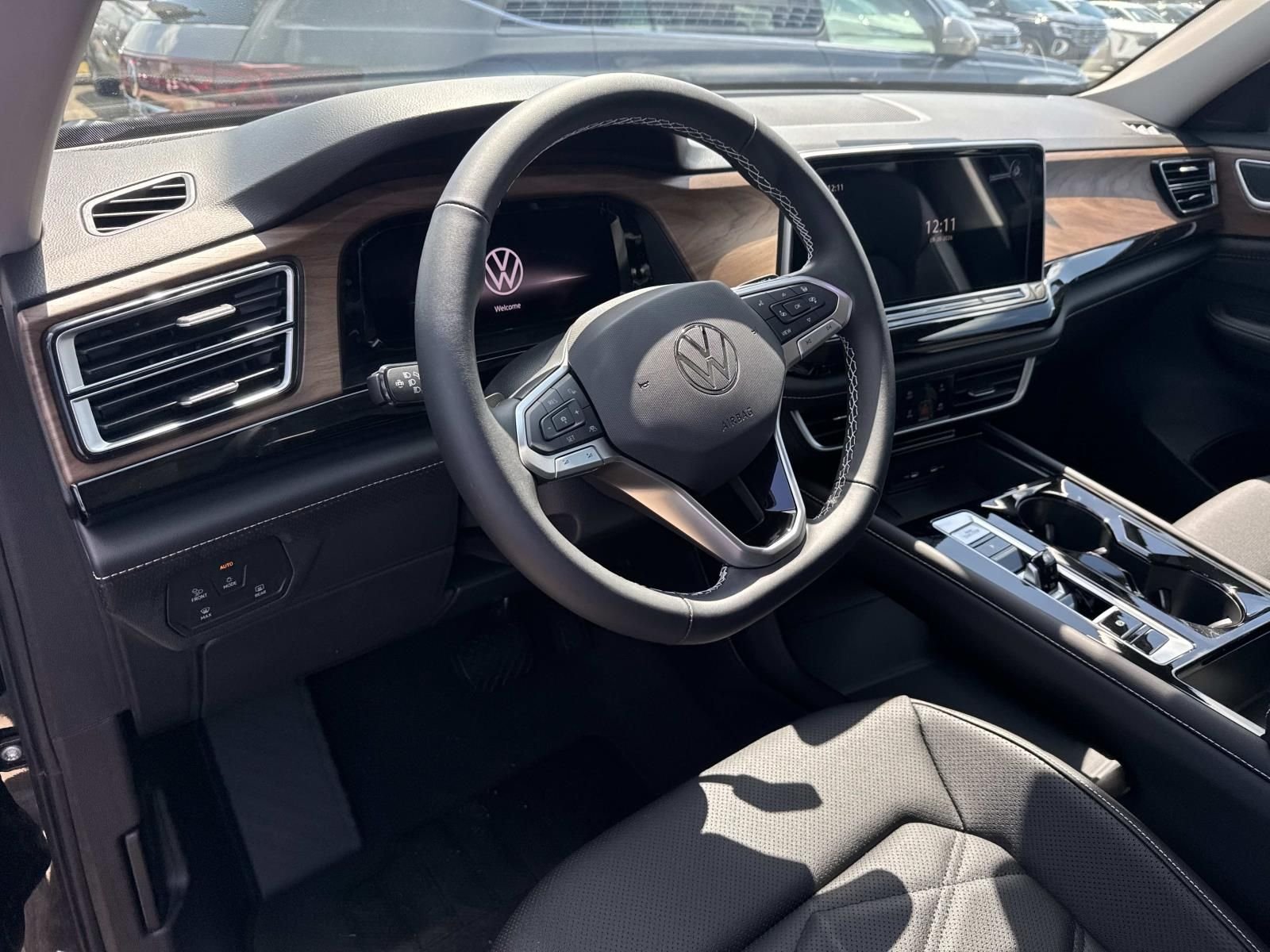 New 2026 Black Volkswagen SE w/Technology image 11