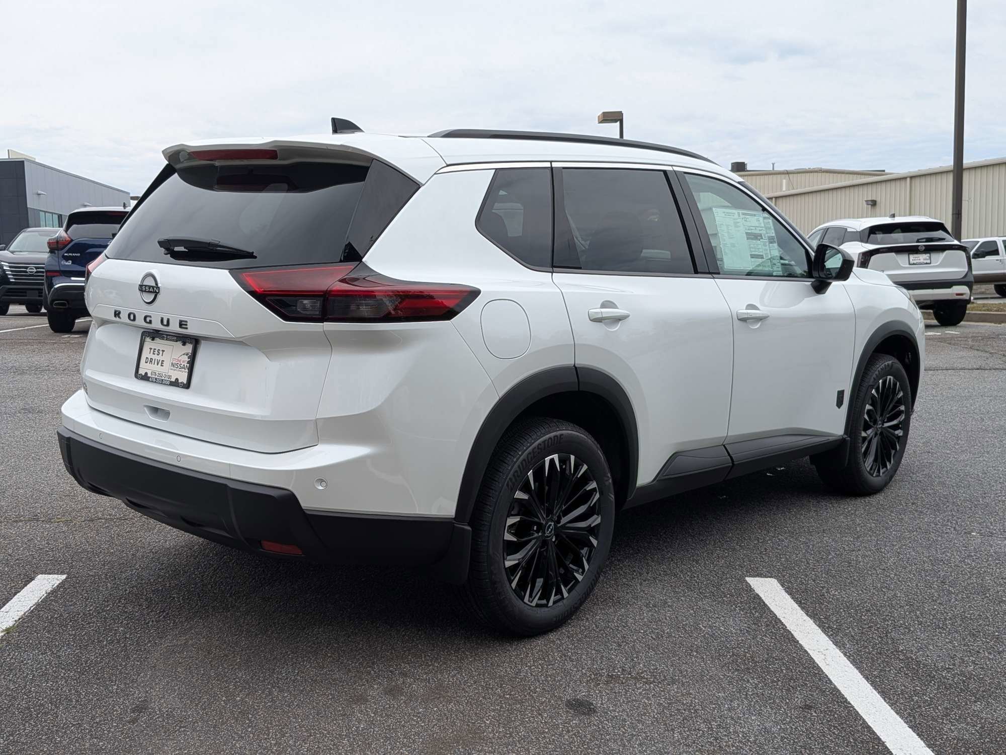 New 2026 White Nissan Dark Armor image 3