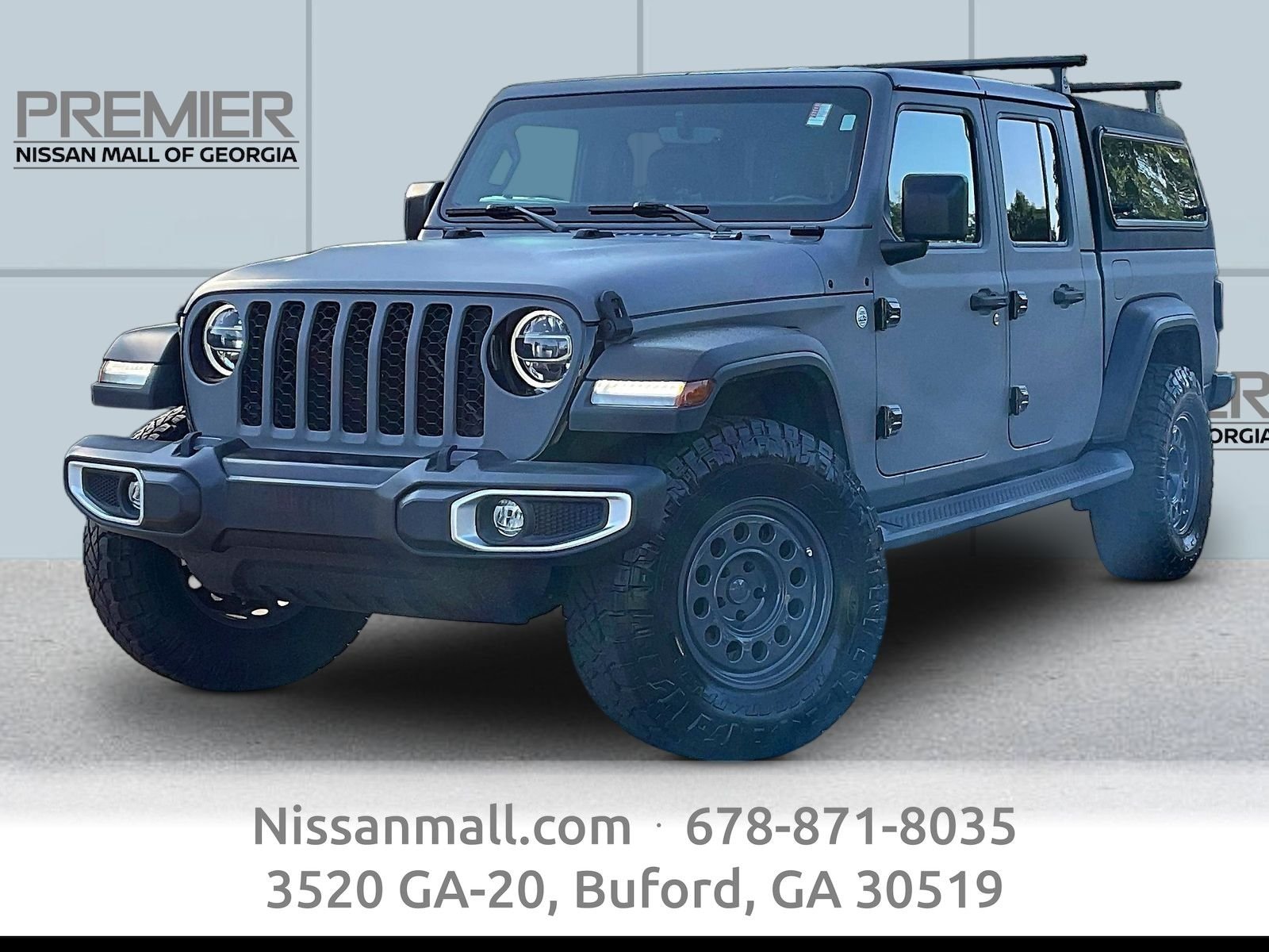 Used 2021 Black Jeep Sport image 1