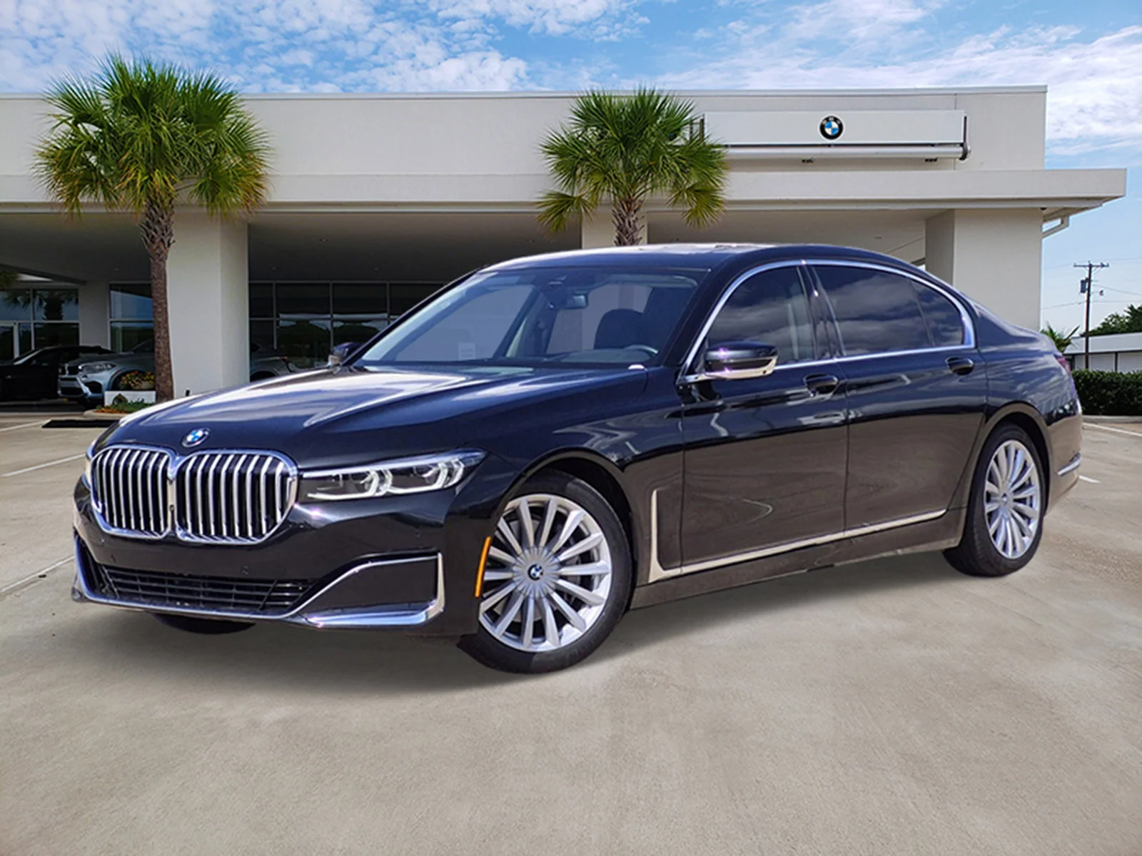 Used 2022 Black Sapphire Metallic BMW 740i image 1
