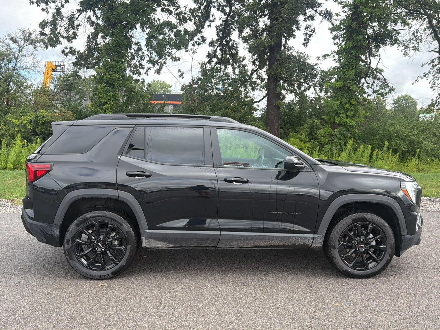 Used 2026 Ebony Twilight Metallic GMC AWD Elevation image 3