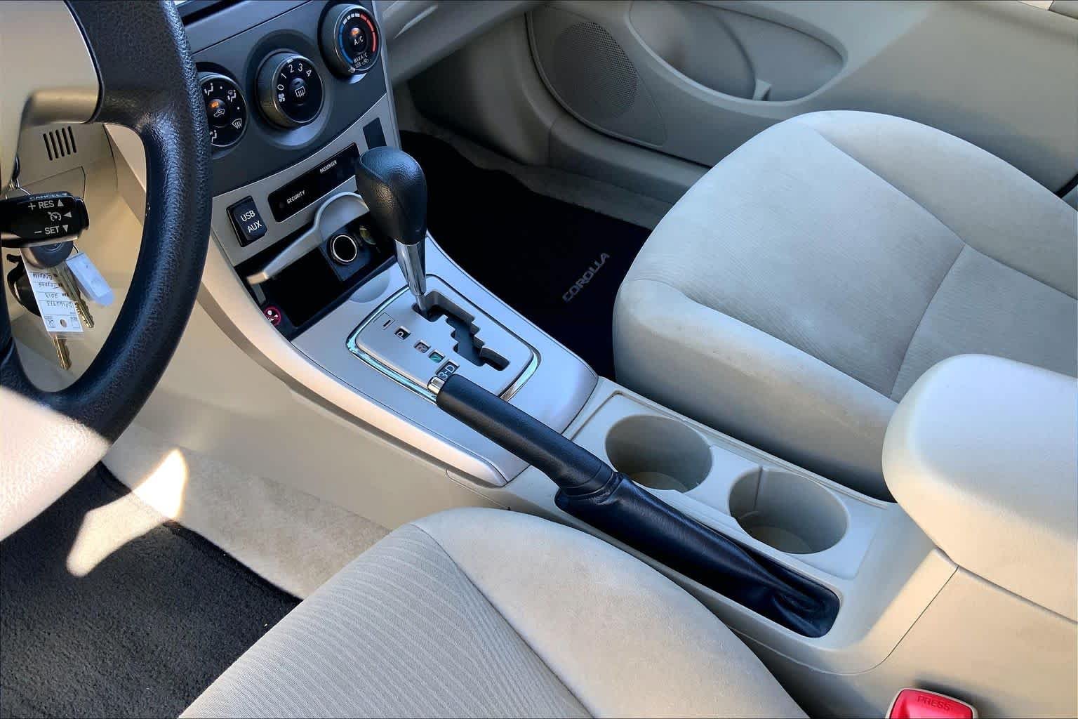 Used 2013 Tropical Sea Metallic Toyota LE image 17