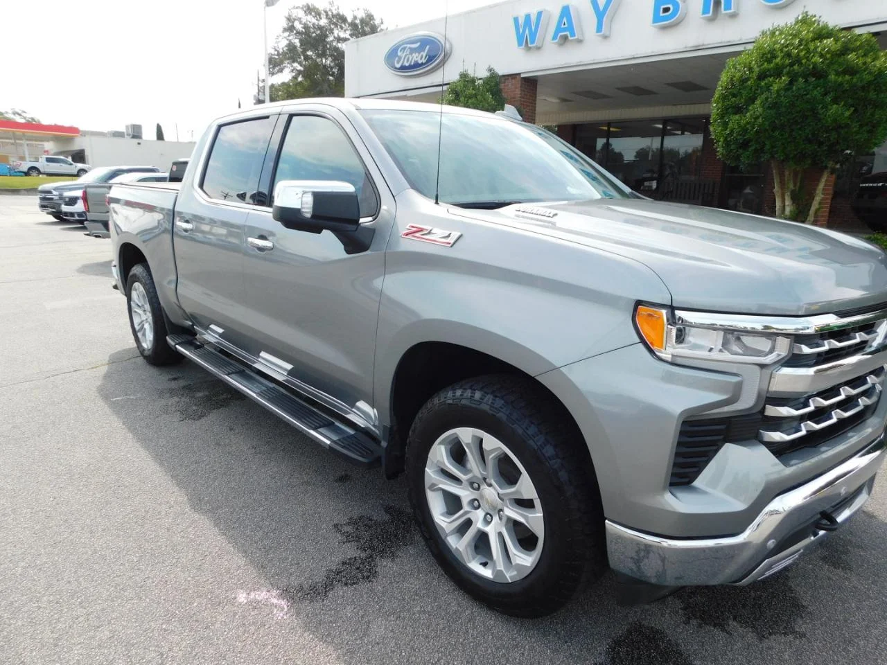 Used 2023 Silver Chevrolet 4WD CREW CAB 147 in LTZ image 2