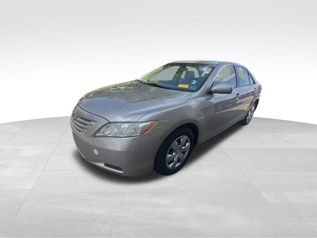 Used 2009 Gold Toyota LE image 2