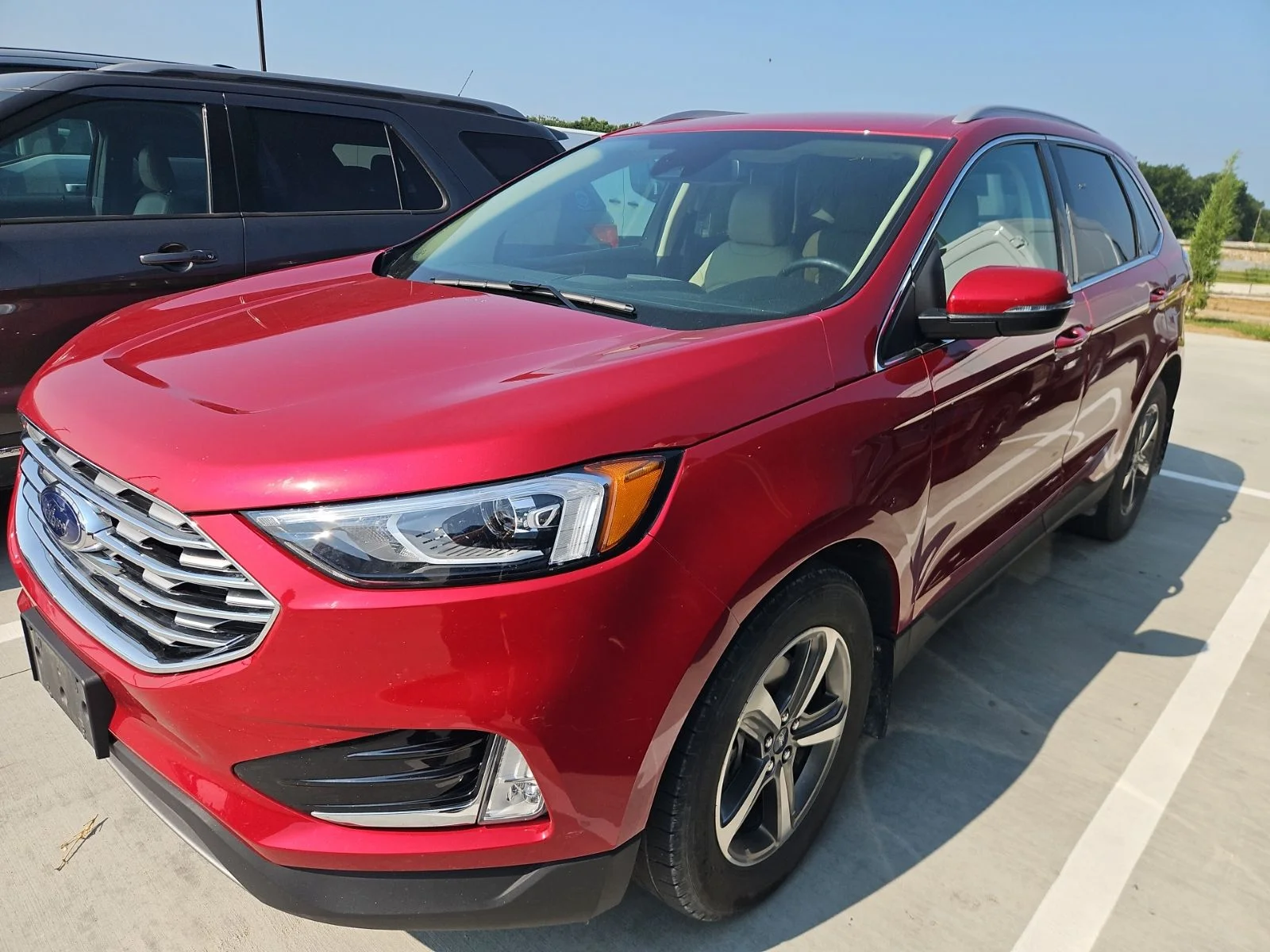 Certified Used 2020 Red Metallic Ford SEL image 2