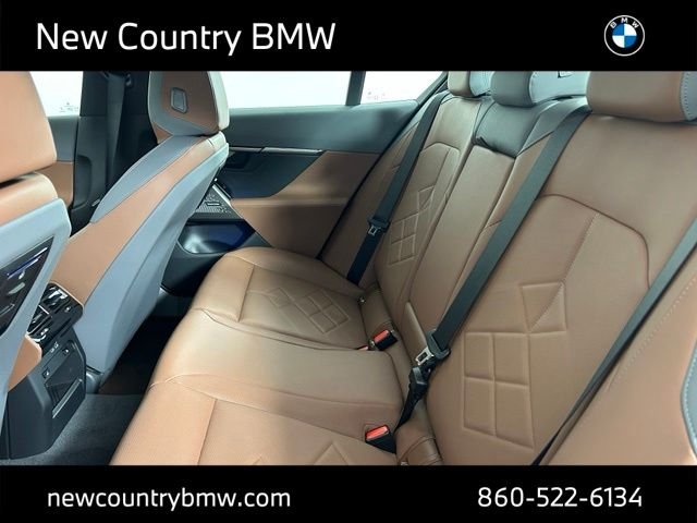 New 2026 Mineral White Metallic BMW 550e xDrive image 23