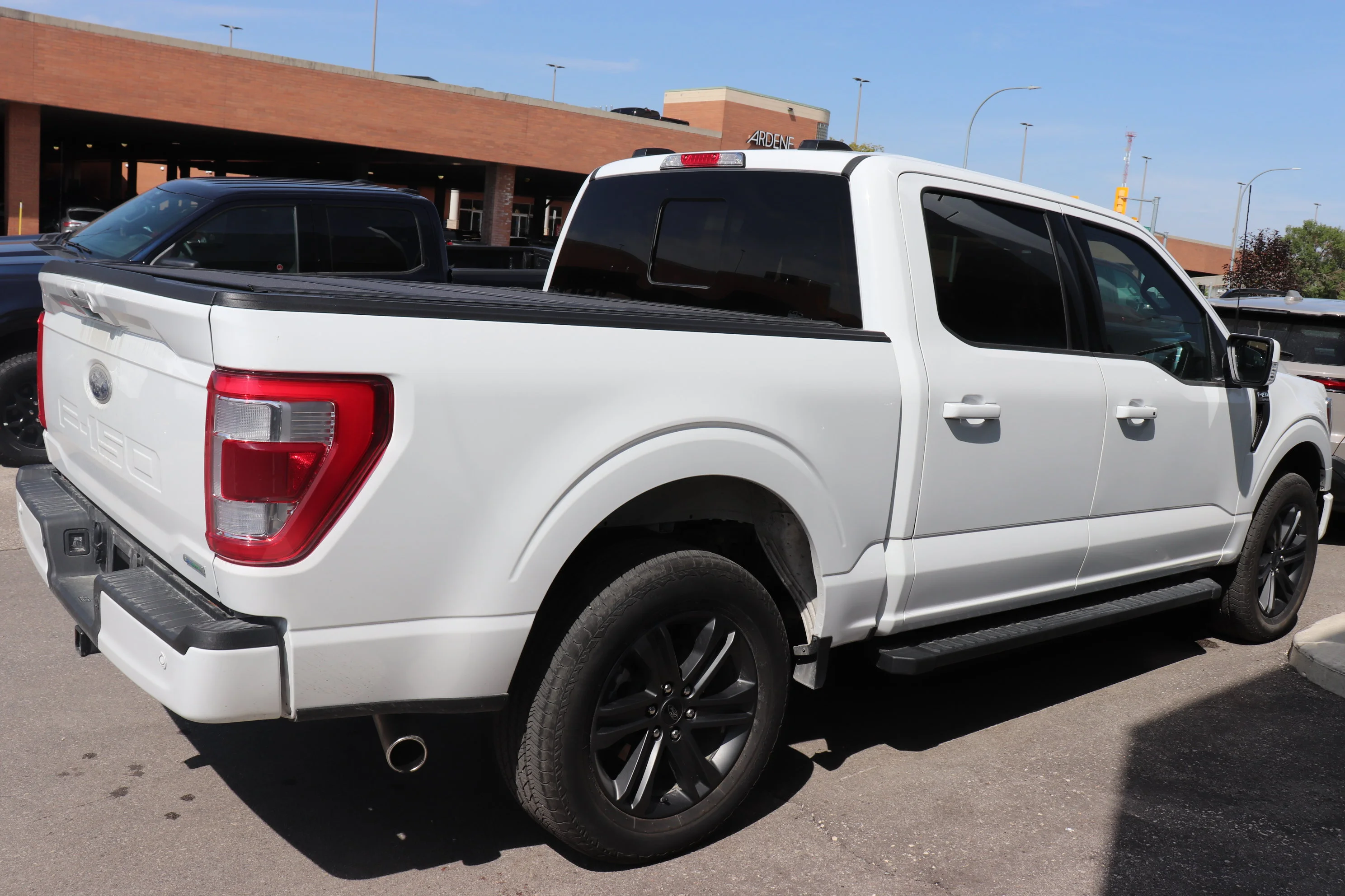 Certified Used 2023 Silver Ford Lariat 4WD SuperCrew 5.5