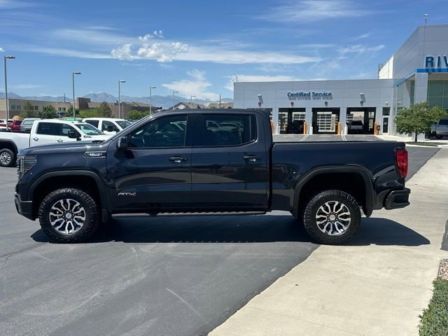 Certified Used 2023 Titanium Rush Metallic GMC AT4 image 2