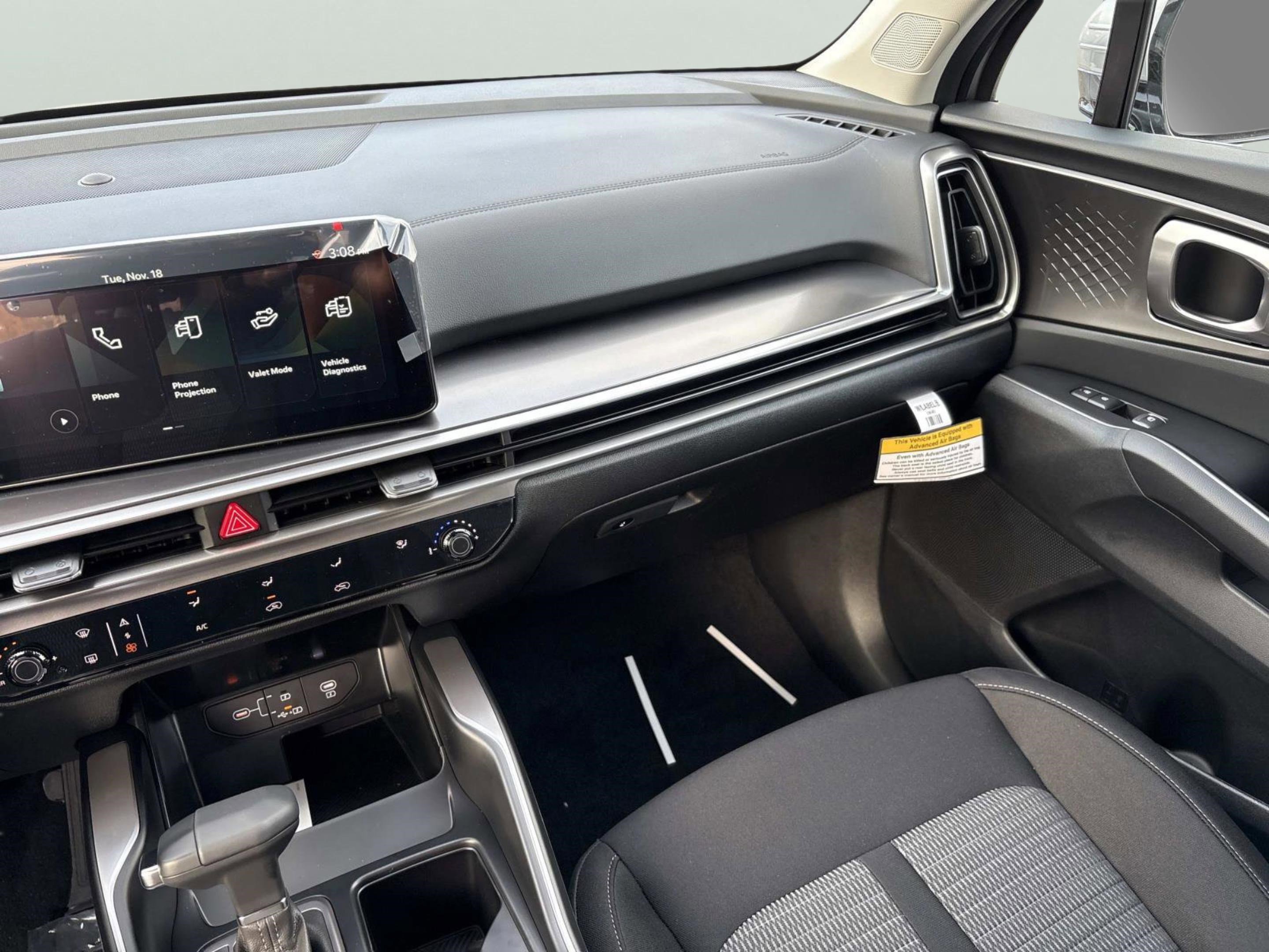 New 2026 Ivory Silver Kia LX image 14
