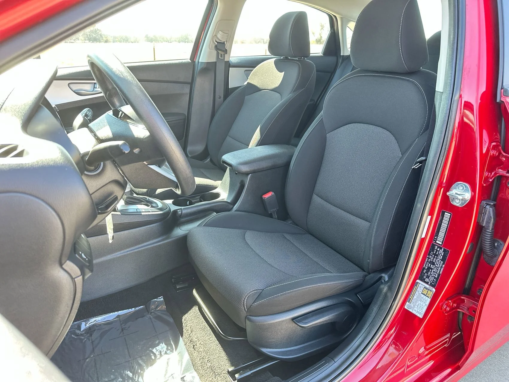 Used 2024 Currant Red Kia LXS image 11