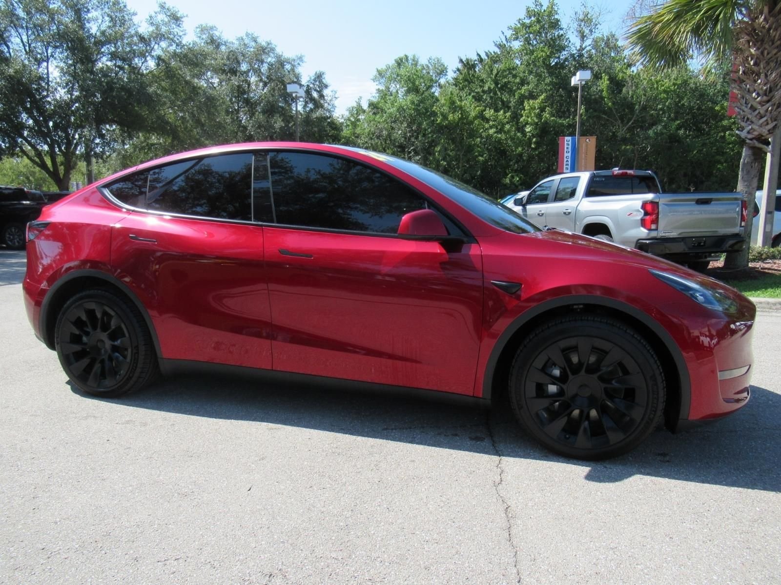 Used 2024 Tesla Model Y Long Range with VIN 7SAYGDEE0RA236401 for sale in Gainesville, FL