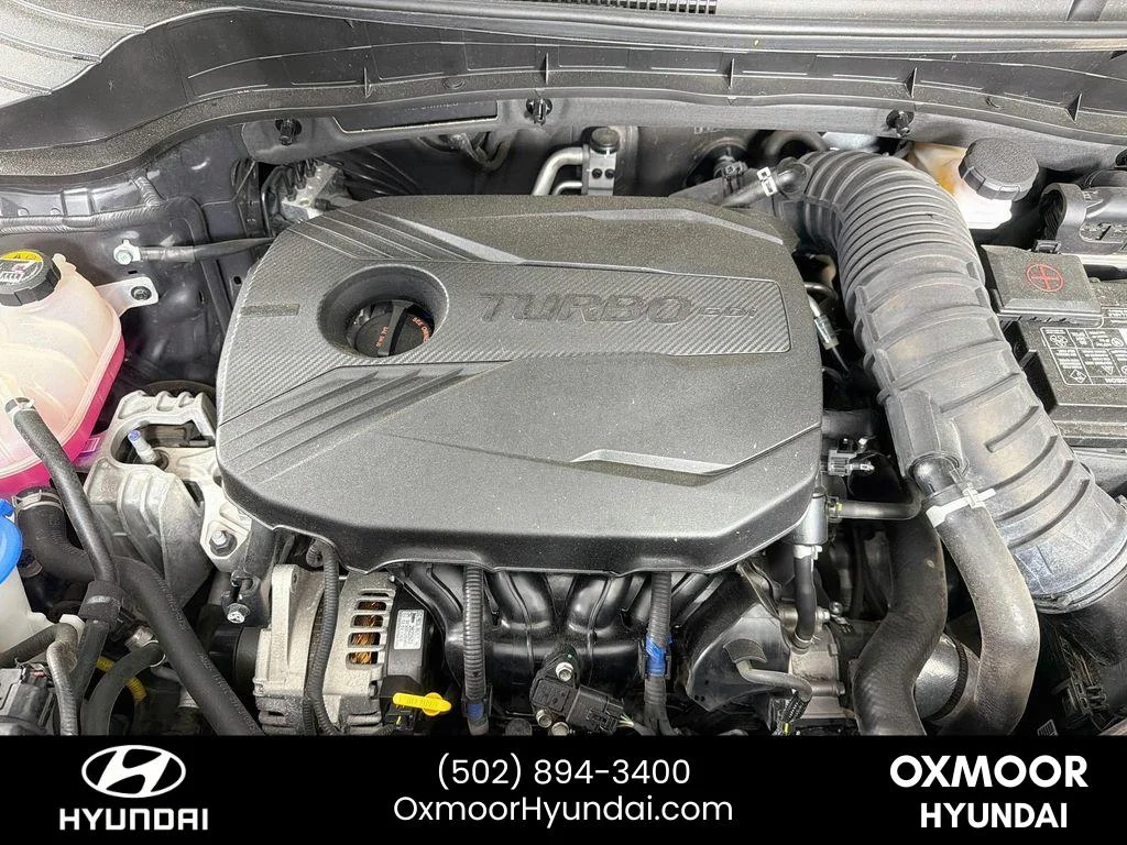 Used 2022 Cherry Black Kia Turbo image 31