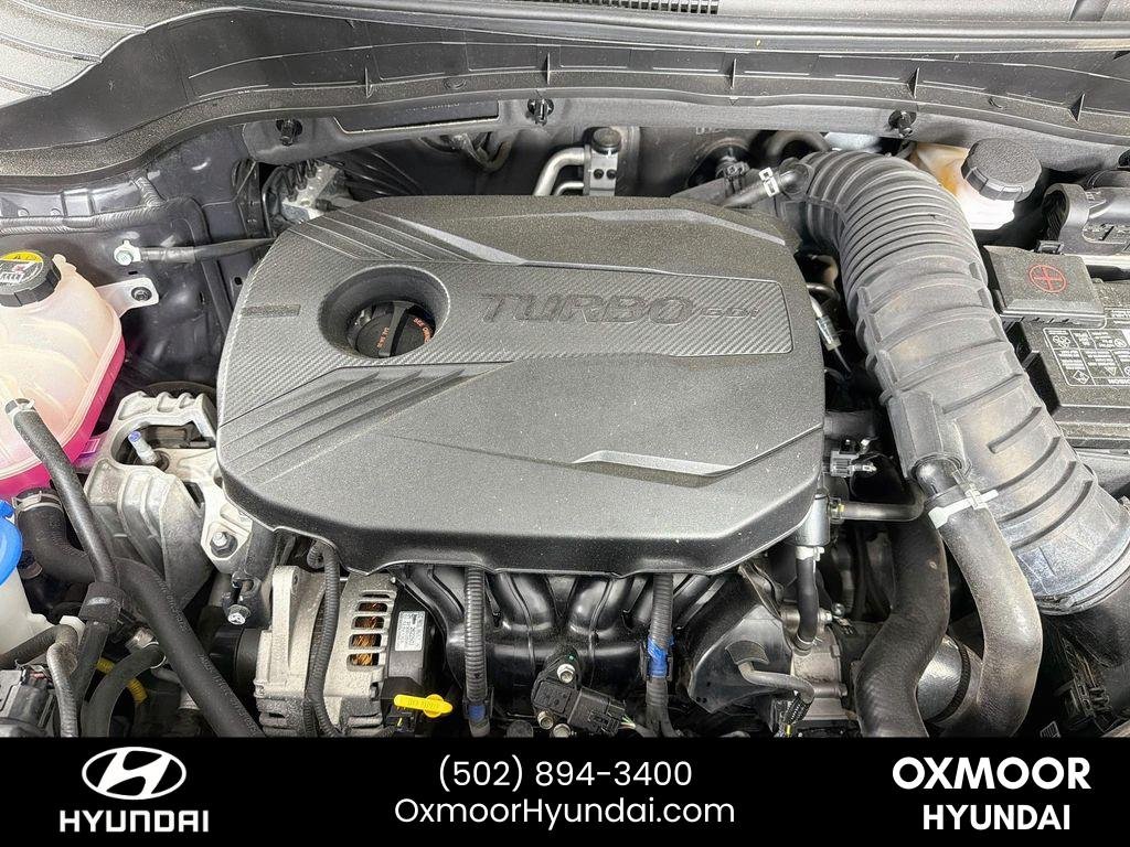 Used 2022 Cherry Black Kia Turbo image 31