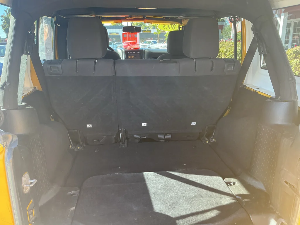 Used 2015 Baja Yellow Jeep Sport image 15