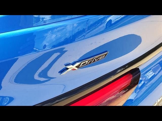 Used 2024 Misano Blue Metallic BMW 228i xDrive image 15