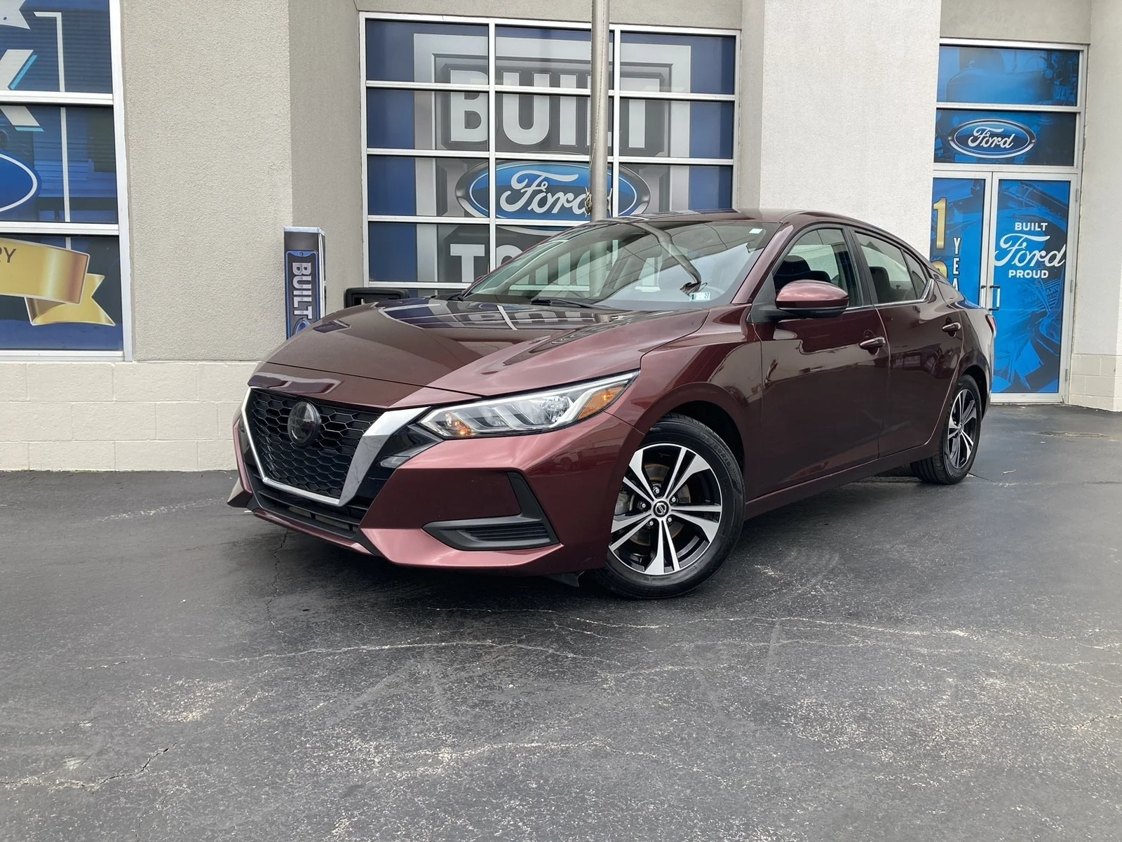 Used 2022 Rosewood Metallic Nissan SV image 1